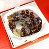 CHAPELET GRENAT TRANSLUCIDE ET SAPHIR "LE SANGUINIS"