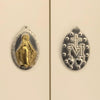 MÉDAILLE MIRACULEUSE EN ACIER INOXYDABLE BICOLORE 30X20MM