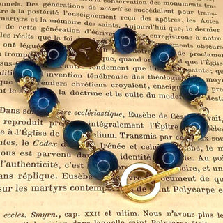 BRACELET DIZAINIER ORAMUSTE EN ŒIL DE TIGRE (Bleu Azur)